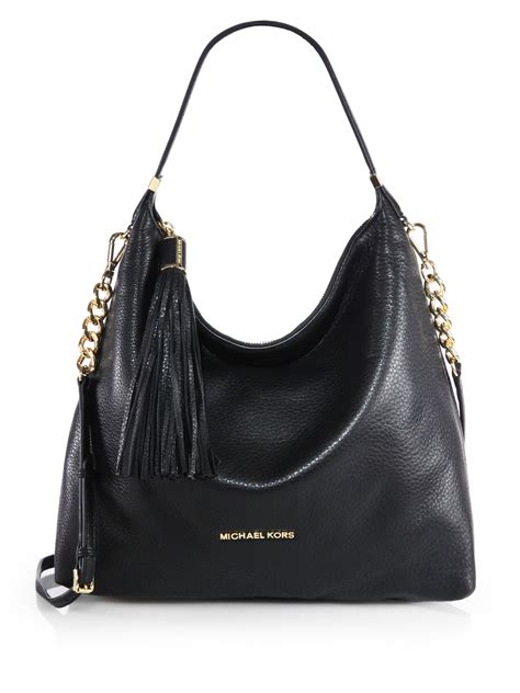 michael kors purses black|michael kors black ribbed purses.